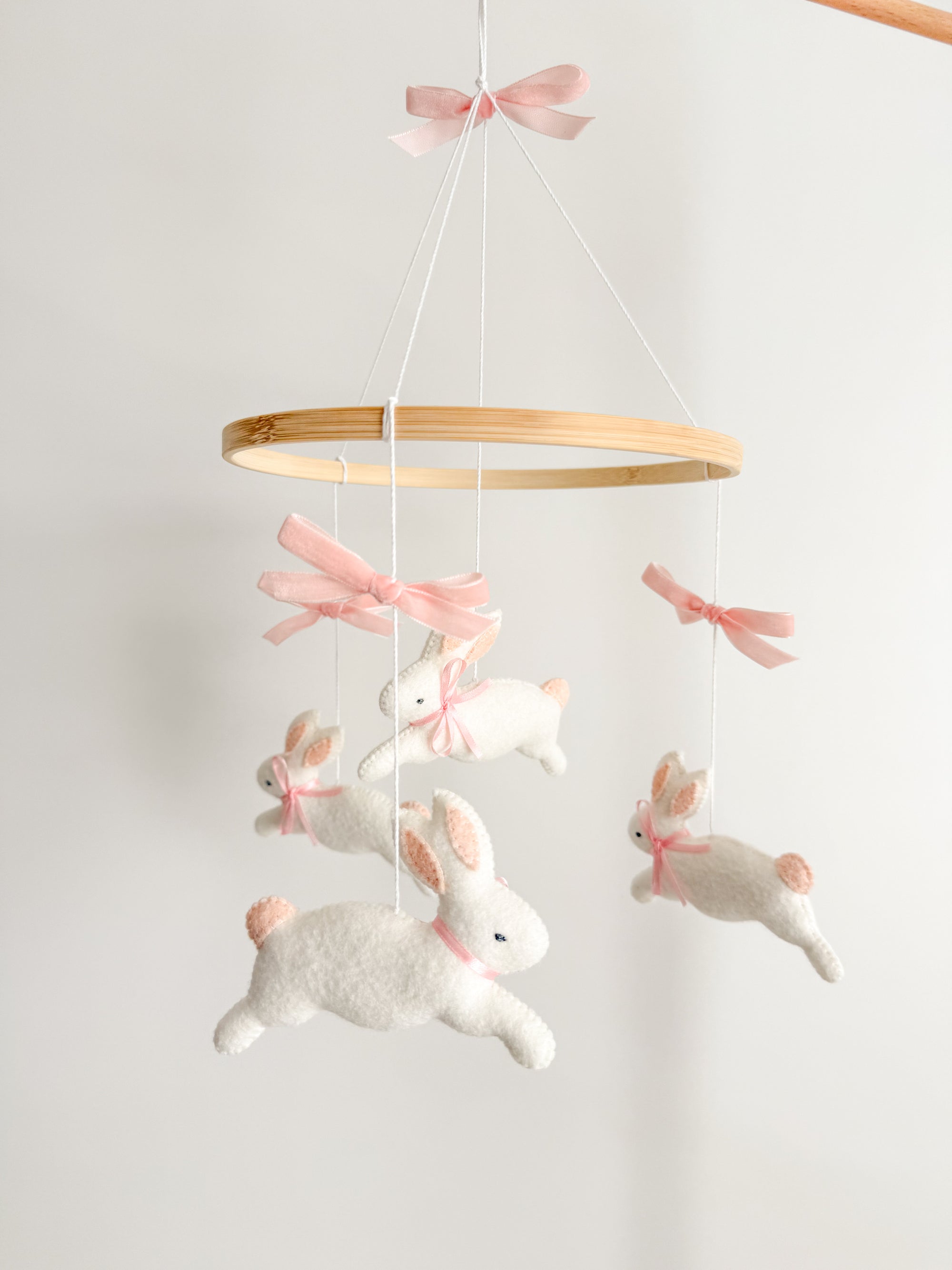 Bunny mobile with pink bows
