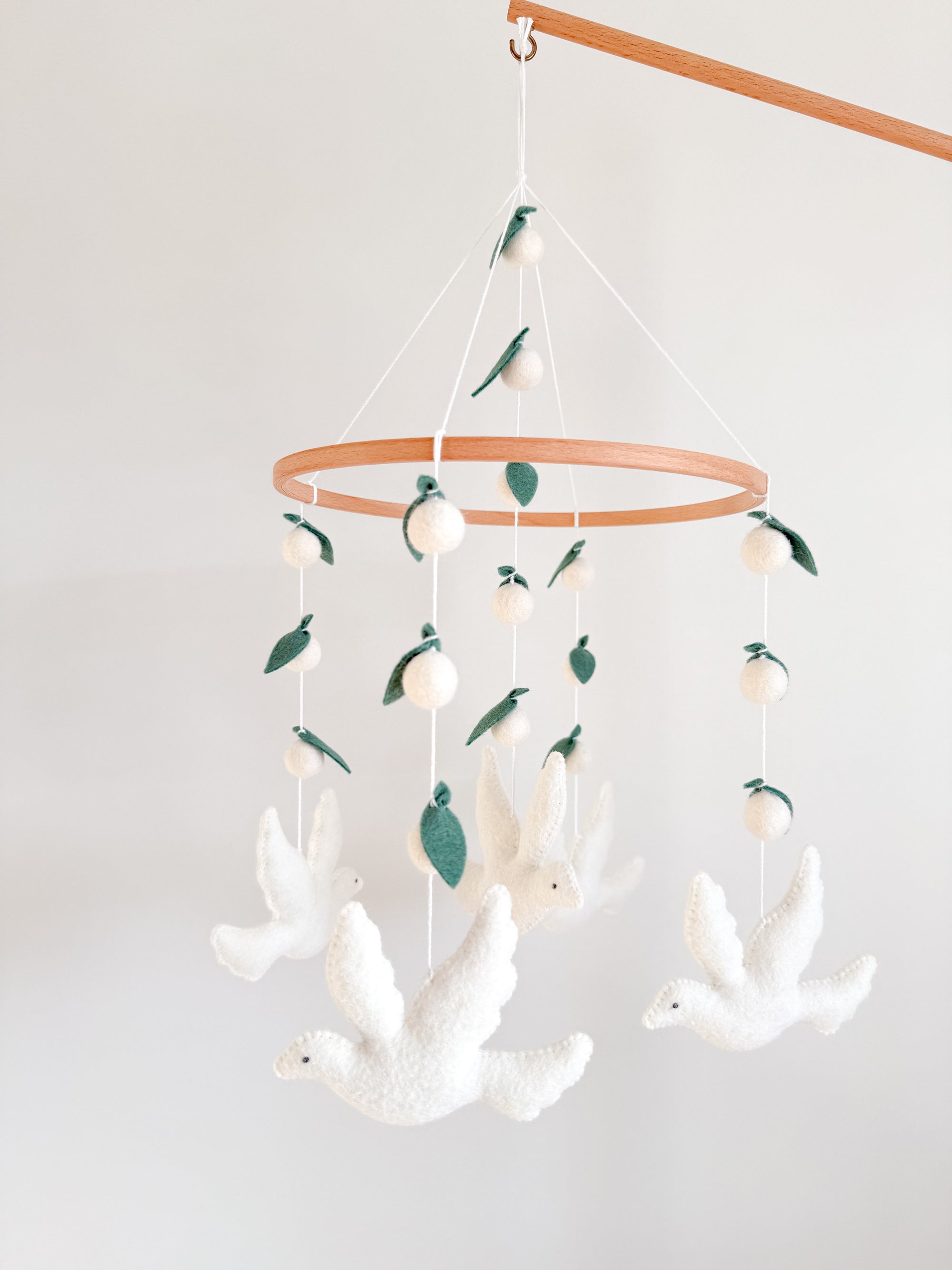 Dove mobile with leaves