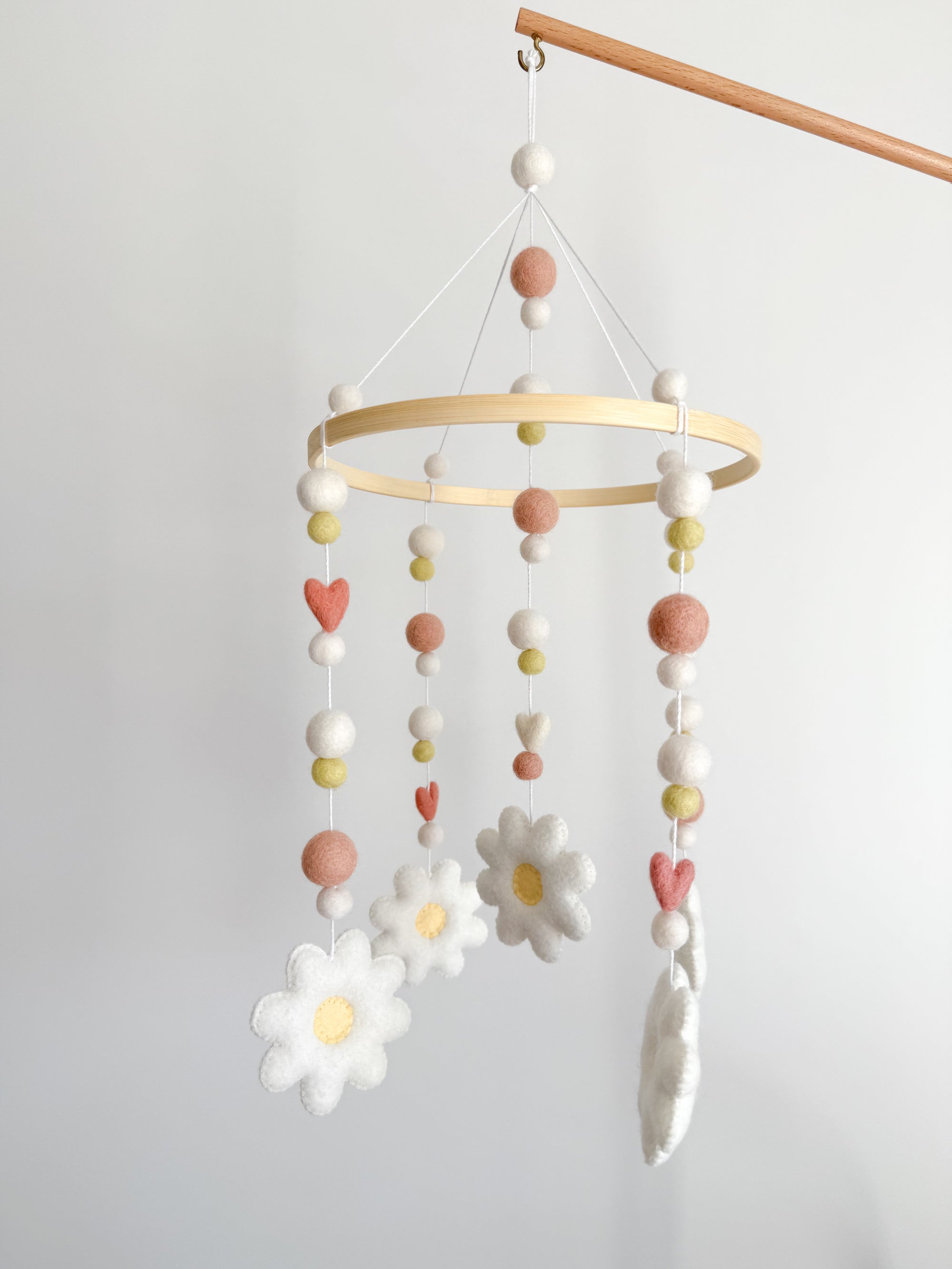 Mobile with daisies and small hearts