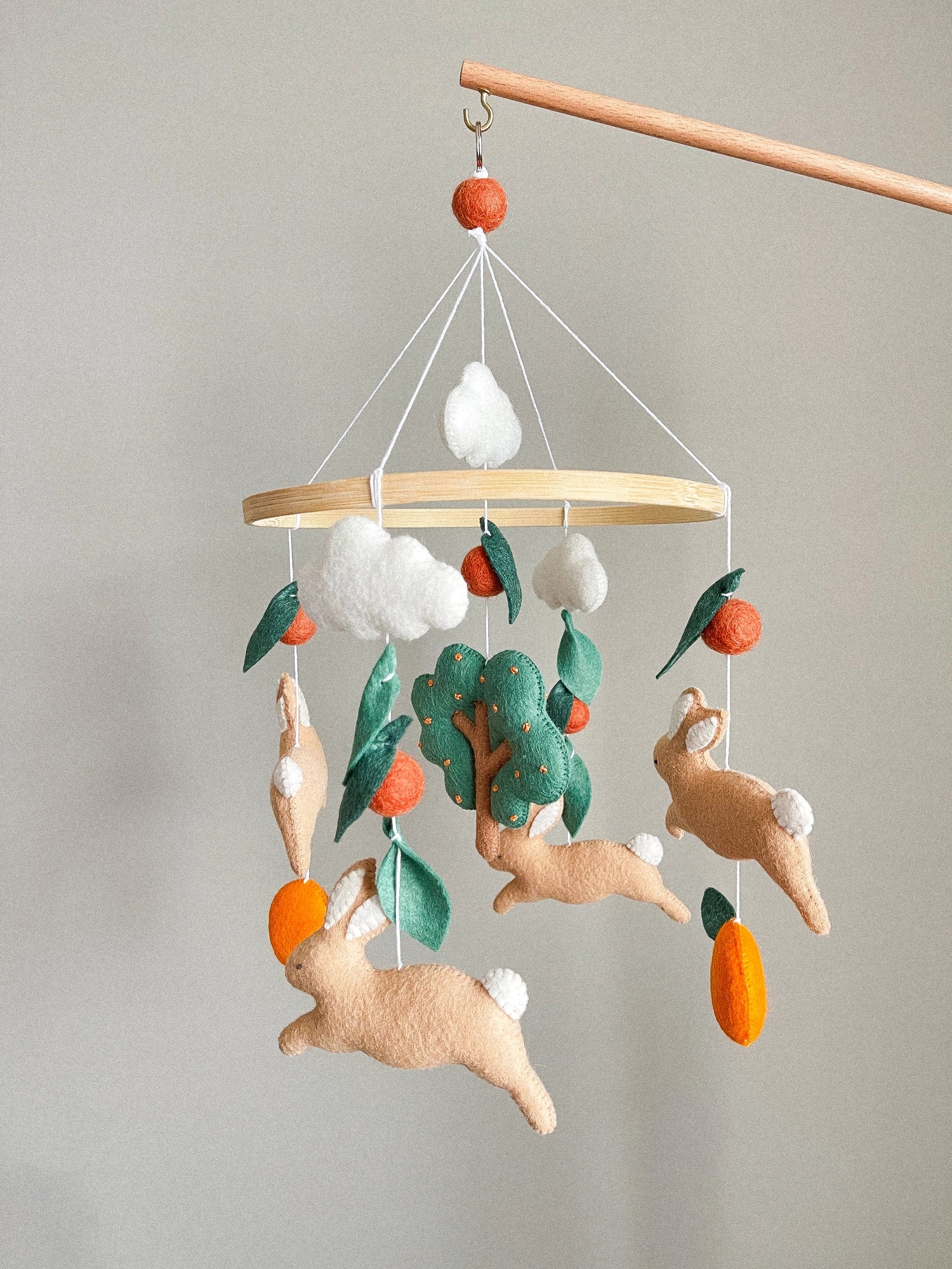 Bunny mobile with orange tree