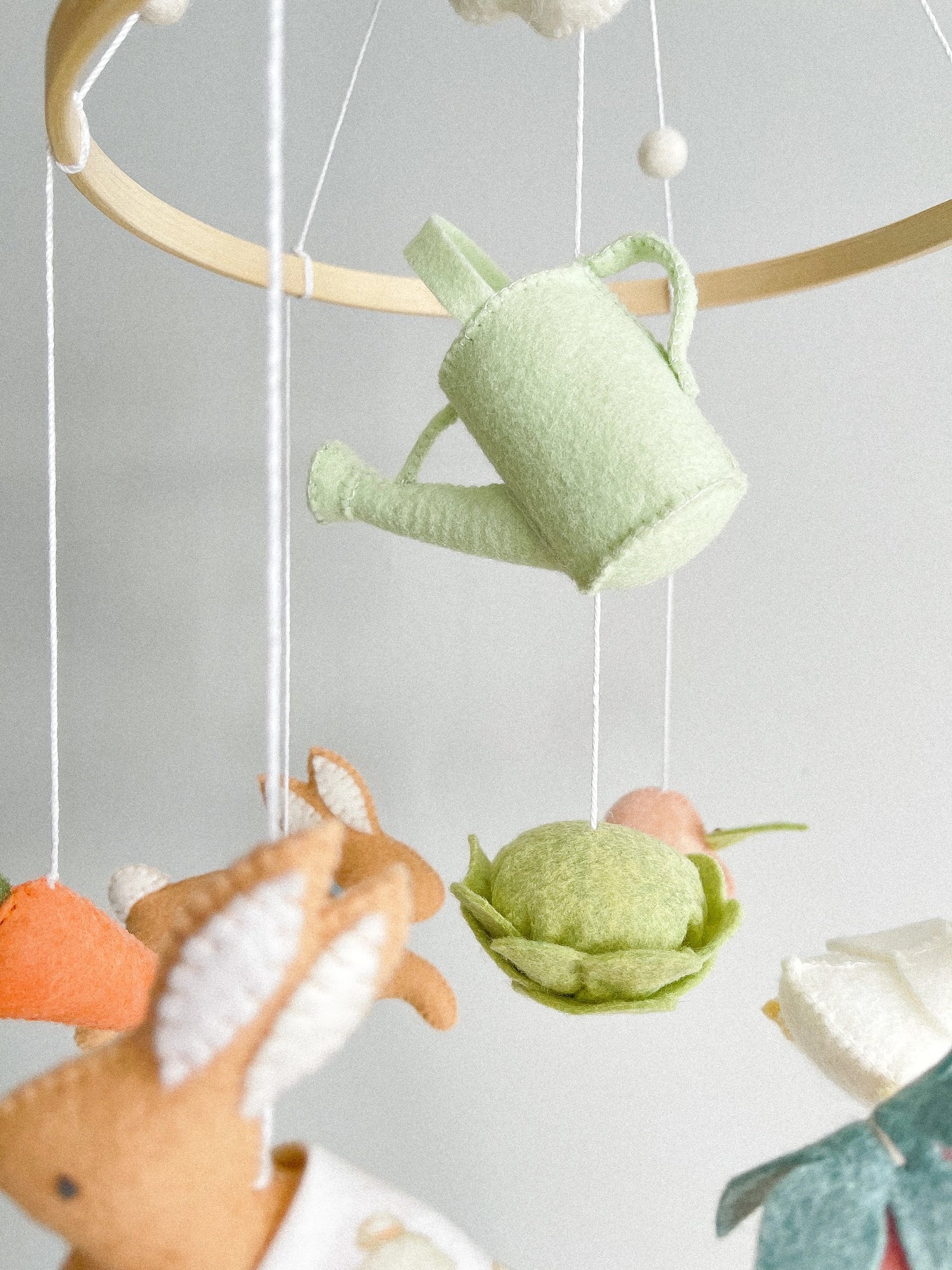 Garden rabbit mobile with watering can