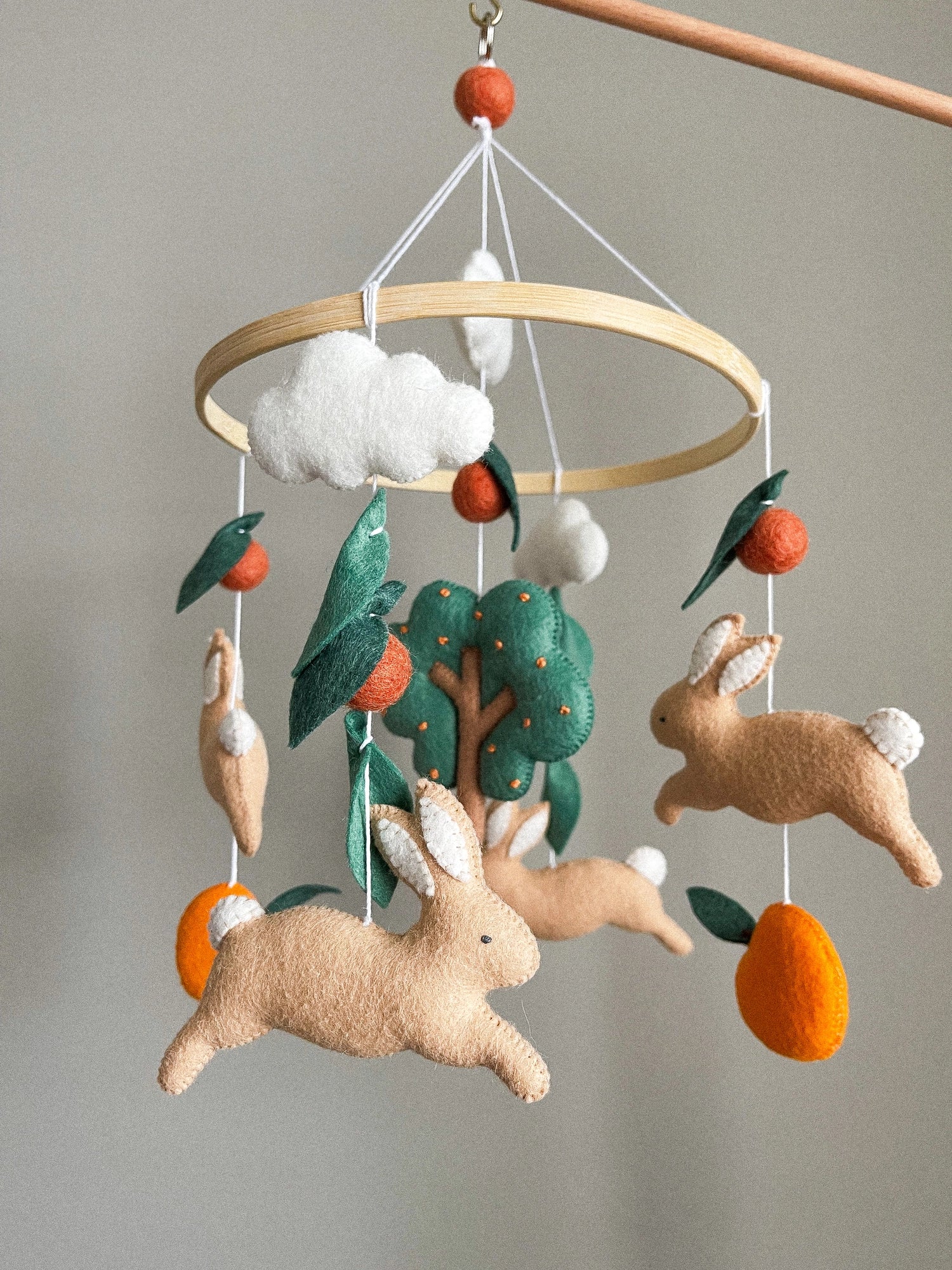 Bunny mobile with orange tree