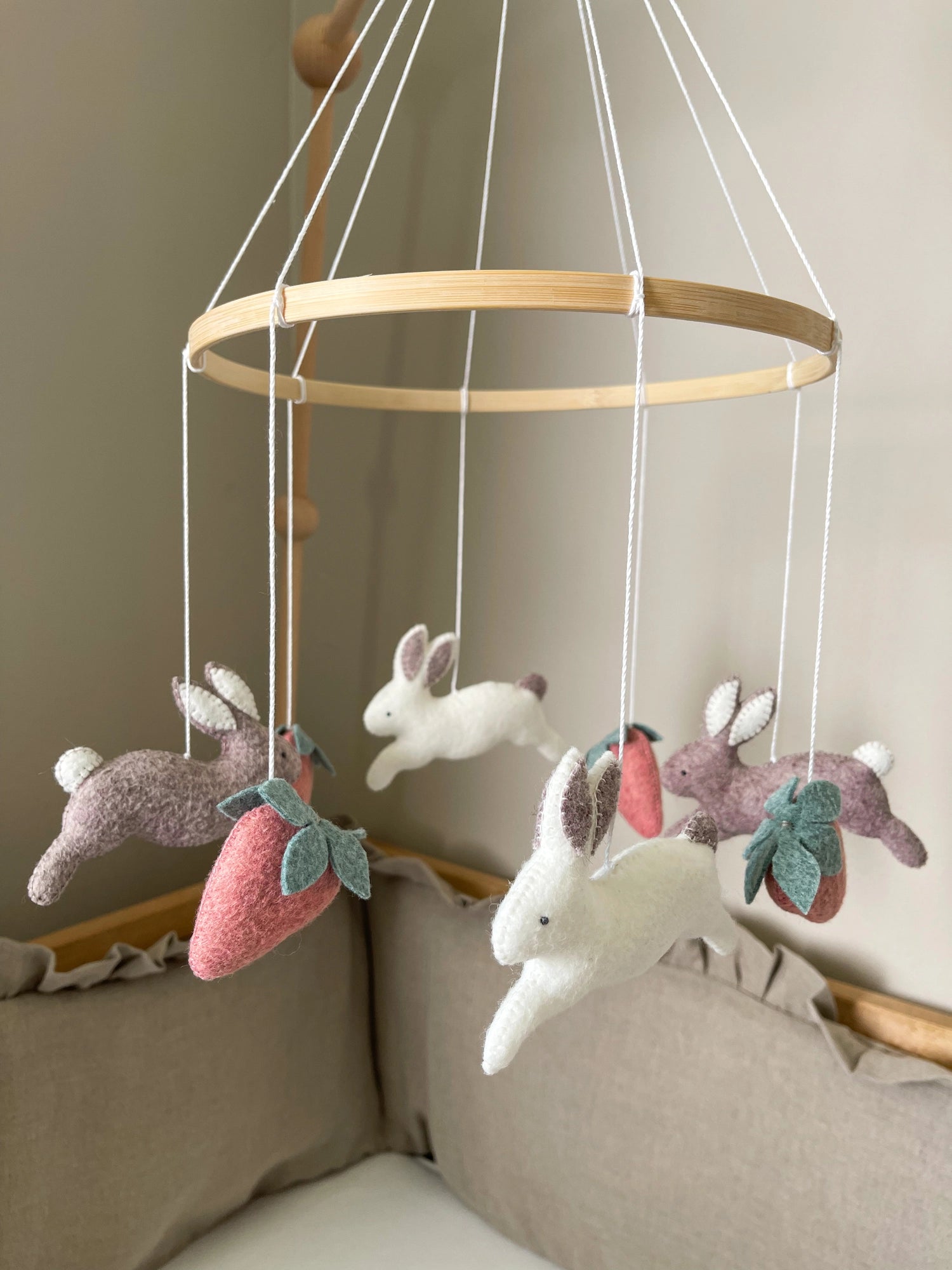 Minimalist bunny mobile with strawberries