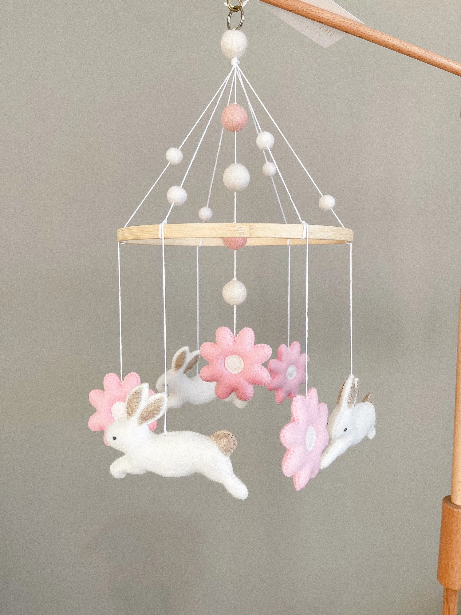 Bunny mobile with pink flowers