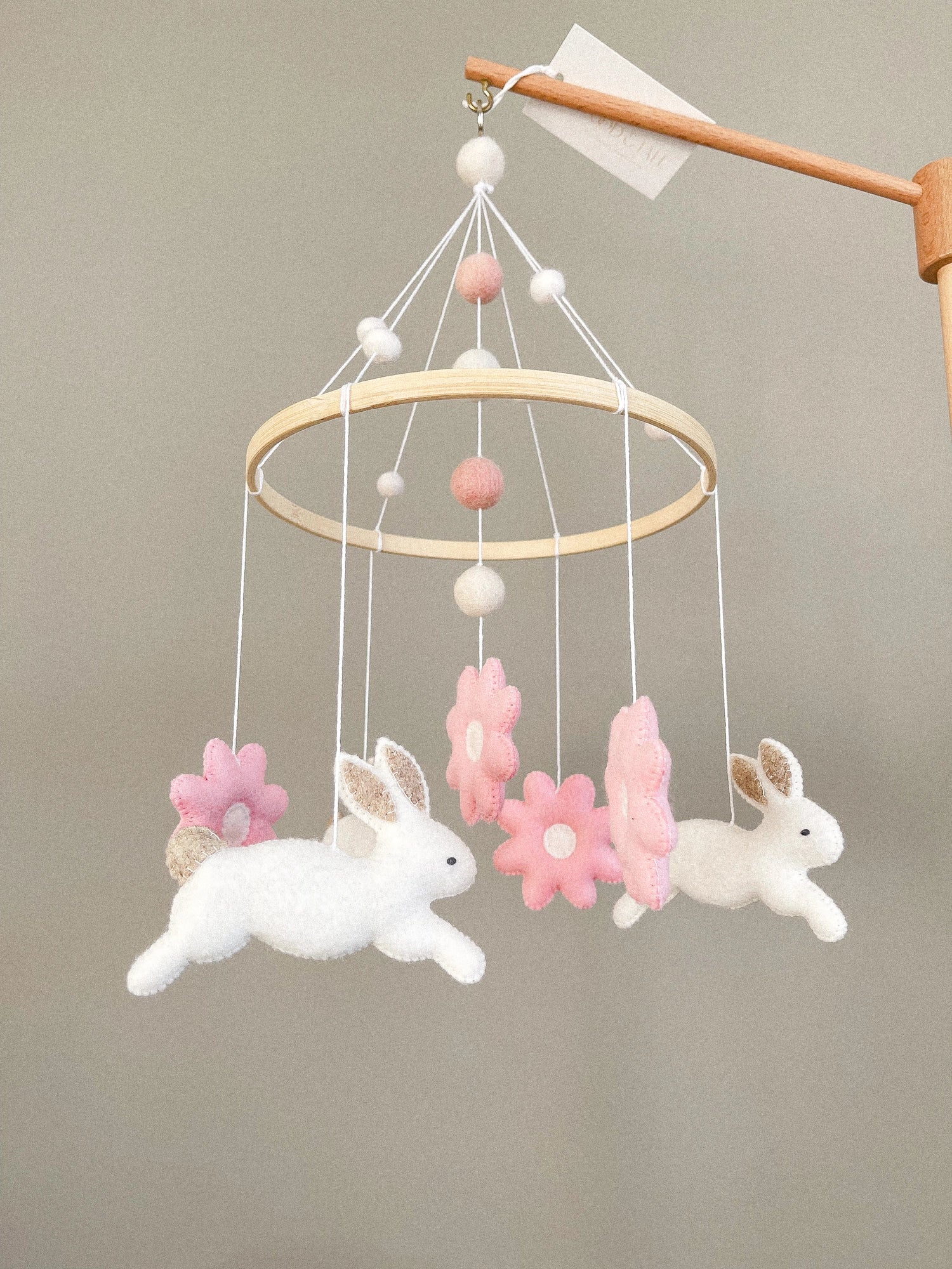 Bunny mobile with pink flowers