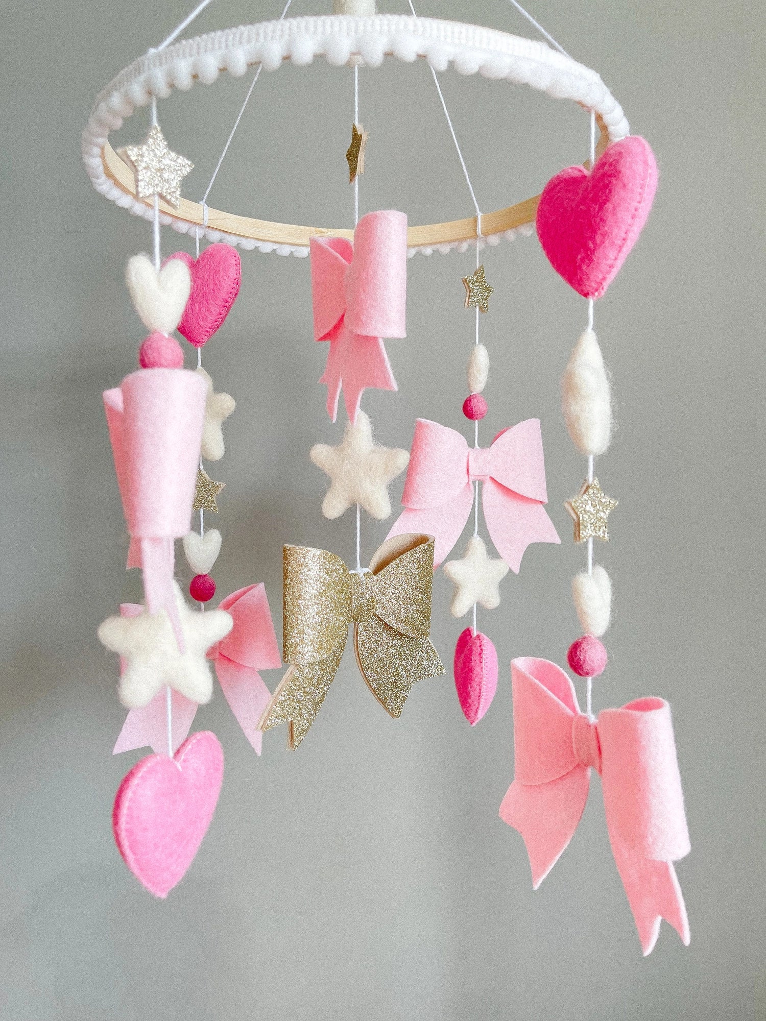Bow mobile with glitter details