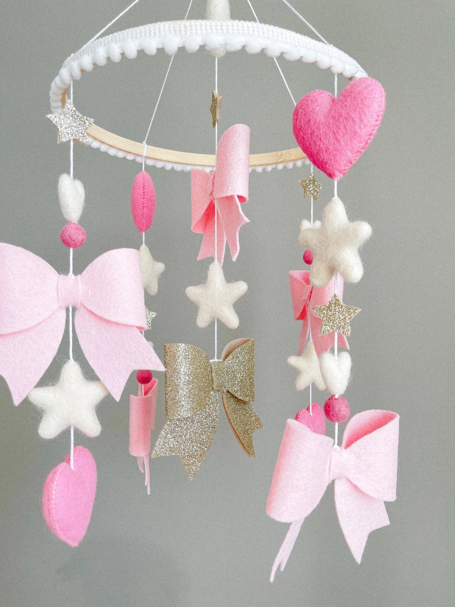 Bow mobile with glitter details