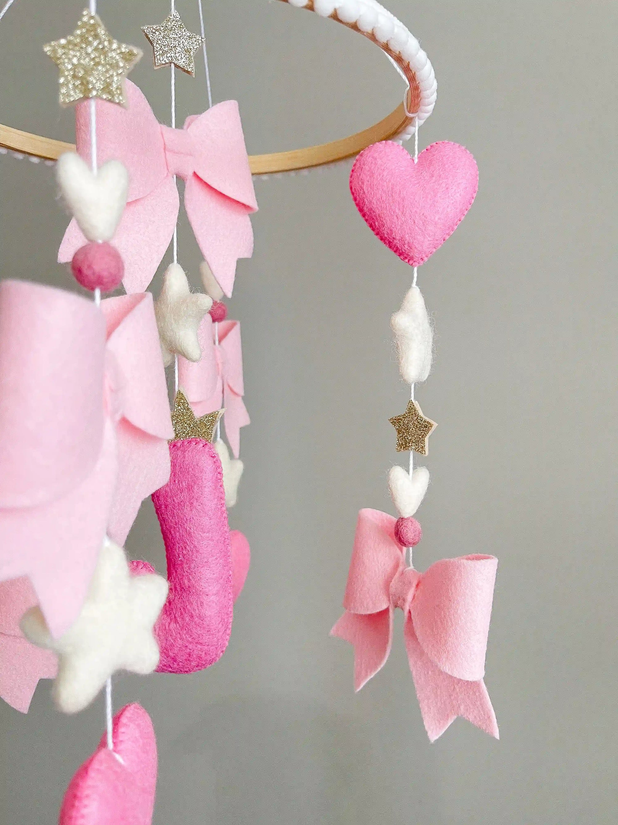 Personalized bow mobile with glitter details