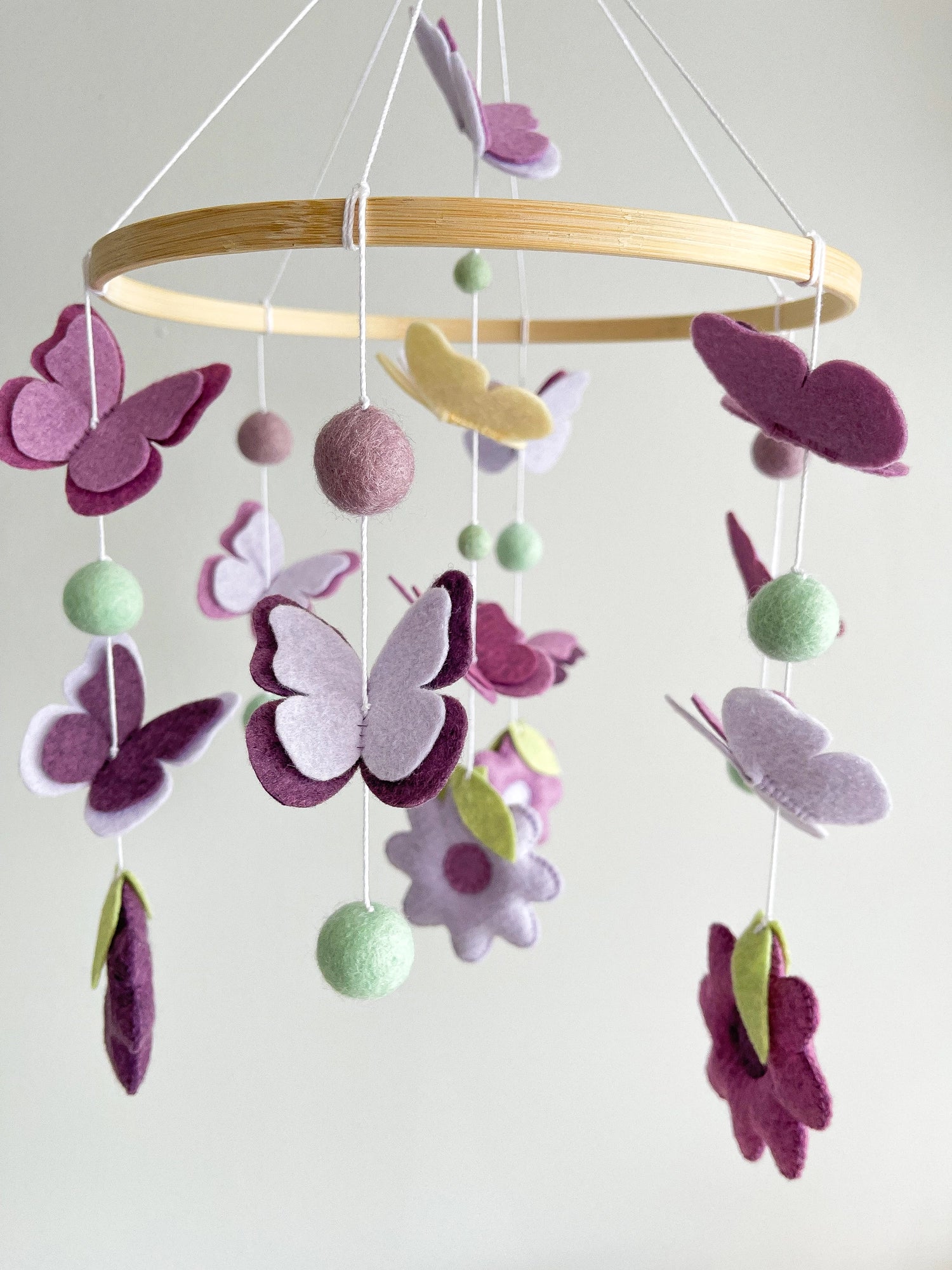 Purple mobile with butterflies and flowers