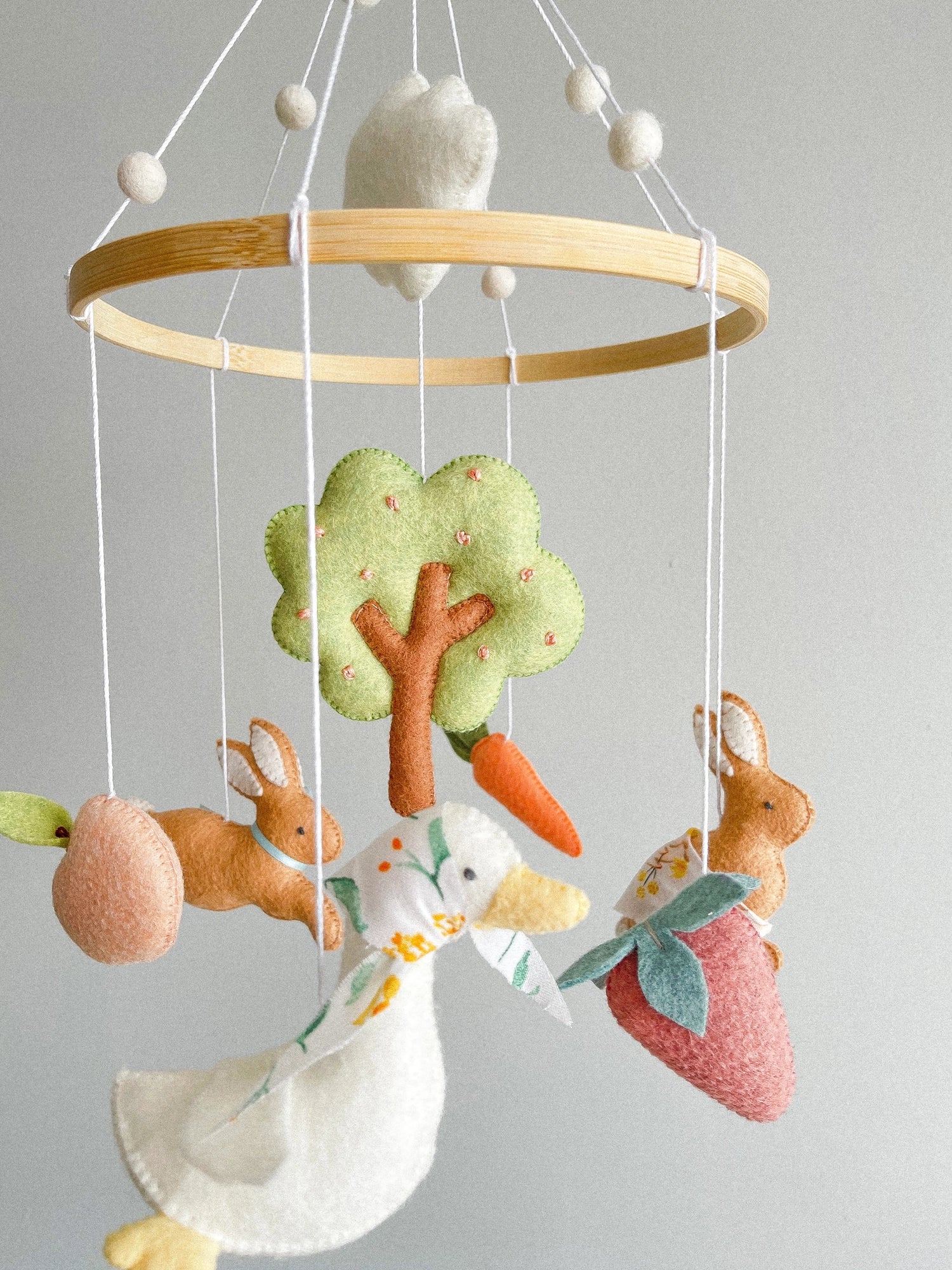 Garden rabbit mobile with apple tree