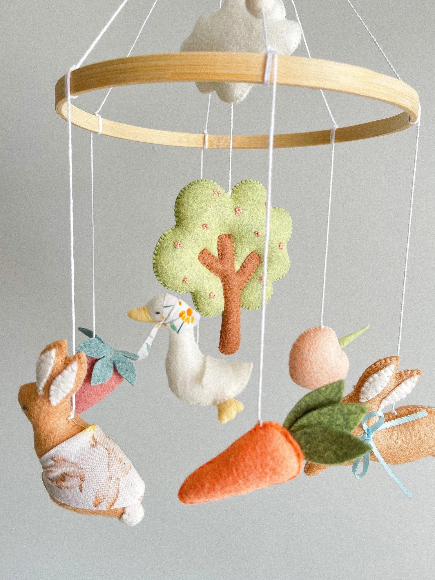 Garden rabbit mobile with apple tree