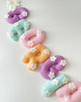 Name banner with daises