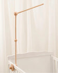 Wooden holder for crib mobile