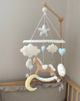 Brown rocking horse mobile with clouds