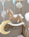 Brown rocking horse mobile with clouds