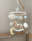 Brown rocking horse mobile with clouds